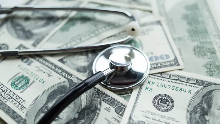 Insurer Submits Initial Bid as Debt-Ridden Healthcare Provider Enters Auction